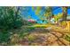 Large backyard with a wooden fence, offering space for outdoor activities and potential landscaping opportunities at 860 16Th S Ave, St Petersburg, FL 33701