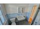 Vintage bathroom with blue tile, classic sink, and medicine cabinet at 860 16Th S Ave, St Petersburg, FL 33701