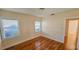 Bedroom featuring wood flooring and natural light from two windows at 860 16Th S Ave, St Petersburg, FL 33701