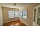 Cozy dining area with hardwood floors, natural light and built-in cabinet for added charm at 860 16Th S Ave, St Petersburg, FL 33701