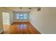 Hardwood living room featuring an open floor plan with natural light at 860 16Th S Ave, St Petersburg, FL 33701
