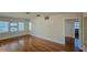 Hardwood living room featuring an open floor plan and three windows at 860 16Th S Ave, St Petersburg, FL 33701