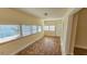 Sunroom with a view: multiple windows offer ample sunlight and ventilation at 860 16Th S Ave, St Petersburg, FL 33701