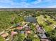 Overhead view showcases the property's proximity to lake and golf course at 8746 Tantallon Cir, Tampa, FL 33647