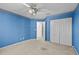 Bedroom featuring carpet and closet at 8746 Tantallon Cir, Tampa, FL 33647