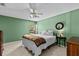 Bedroom featuring a bed, carpet, and furnishings at 8746 Tantallon Cir, Tampa, FL 33647