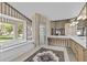 Large main bathroom featuring dual sinks, a soaking tub, walk in shower, and neutral finishes at 8746 Tantallon Cir, Tampa, FL 33647
