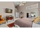The main bedroom boasts lots of natural light, vaulted ceilings, and neutral colors creating a relaxing atmosphere at 8746 Tantallon Cir, Tampa, FL 33647