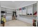 Well-organized walk-in closet with shelving and hanging space at 8746 Tantallon Cir, Tampa, FL 33647