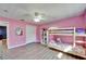 Adorable bedroom with bunkbeds, wood floors, and closet at 1006 Mandalay Dr, Brandon, FL 33511