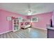 Colorful bedroom featuring bunkbeds, wood floors, and great natural light at 1006 Mandalay Dr, Brandon, FL 33511