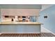 Spacious kitchen with modern appliances, ample countertop space and warm lighting at 1006 Mandalay Dr, Brandon, FL 33511