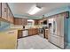 Spacious kitchen with stainless steel appliances, ample counter space, and tile flooring at 1006 Mandalay Dr, Brandon, FL 33511