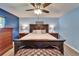 Beautifully decorated main bedroom features a large bed and matching furniture at 1006 Mandalay Dr, Brandon, FL 33511