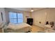 Bedroom with a queen bed, closet, and light-colored decor at 10351 Regal Dr # 18, Largo, FL 33774