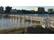 Waterfront view of a walkway and boat dock from the property at 10351 Regal Dr # 18, Largo, FL 33774