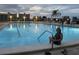 Enjoy the beautiful community pool with city views and plenty of seating at 10351 Regal Dr # 18, Largo, FL 33774