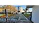Community shuffleboard area with benches and nearby landscaping at 10351 Regal Dr # 18, Largo, FL 33774