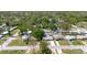 An aerial view shows the home's yard, a driveway, and proximity to neighboring properties at 10686 110Th Ln, Largo, FL 33778