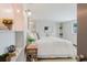 Bedroom with decorative nooks, side tables, and plants at 10686 110Th Ln, Largo, FL 33778