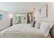 Serene bedroom with a large window, mirrored closet doors, and neutral decor at 10686 110Th Ln, Largo, FL 33778