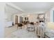 Spacious living room featuring modern decor, an open floor plan, and ample natural light at 10686 110Th Ln, Largo, FL 33778