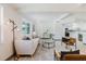 Cozy living room with modern decor, an open layout, and seamless flow into the kitchen at 10686 110Th Ln, Largo, FL 33778
