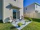 Outdoor seating area with chairs on the back patio at 10727 Penny Gale Loop, San Antonio, FL 33576