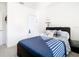 Comfortable bedroom with gray carpet, a ceiling fan, and a window with blinds at 10727 Penny Gale Loop, San Antonio, FL 33576