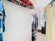 Walk-in closet with ample storage space, including shelves and hanging rods at 10727 Penny Gale Loop, San Antonio, FL 33576