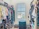 Walk-in closet featuring ample hanging space and shelving at 10727 Penny Gale Loop, San Antonio, FL 33576
