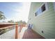 Inviting balcony featuring chairs and sunny views of the community at 112 13Th Ave, Indian Rocks Beach, FL 33785