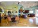 Spacious kitchen with modern appliances, an island, and ample cabinet space, adjacent to the dining area at 112 13Th Ave, Indian Rocks Beach, FL 33785