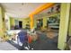 Outdoor living area with nautical decor and colorful furniture at 112 13Th Ave, Indian Rocks Beach, FL 33785