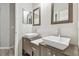 Modern bathroom featuring double vanities with vessel sinks and sleek wood cabinetry at 12304 Silton Peace Dr, Riverview, FL 33579