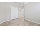 Cozy bedroom with hard surface floors, large closet, and entry to bathroom at 12304 Silton Peace Dr, Riverview, FL 33579