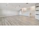 Large bonus room with hardwood floors, recessed lights, and ample natural light at 12304 Silton Peace Dr, Riverview, FL 33579