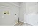 Functional laundry room with shelving and utility connections, ready for appliances at 12304 Silton Peace Dr, Riverview, FL 33579