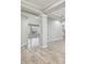 Beautiful living room with hardwood floors, neutral paint, and elegant archways at 12304 Silton Peace Dr, Riverview, FL 33579