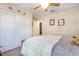 Bedroom featuring a closet, natural light, and carpet at 14205 Stockwell Ln, Ruskin, FL 33573