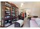 Comfortable living room featuring an antique china cabinet and stylish decor at 14205 Stockwell Ln, Ruskin, FL 33573
