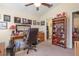 Functional home office with a large desk, comfortable chair, and ample storage space at 14205 Stockwell Ln, Ruskin, FL 33573