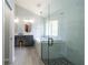 Stylish bathroom with walk-in shower, soaking tub, dual sink vanity and a light color palette at 2206 Green Oaks Ln, Tampa, FL 33612