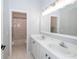 Bright bathroom with double sinks, spacious vanity, and a shower-tub combination at 2206 Green Oaks Ln, Tampa, FL 33612