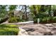 Charming home with lush landscaping, well-manicured lawn, and a welcoming front entrance at 2206 Green Oaks Ln, Tampa, FL 33612