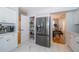 Bright kitchen featuring stainless steel appliances, marble floors, and a spacious pantry at 2206 Green Oaks Ln, Tampa, FL 33612