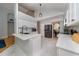 Bright kitchen with white cabinets, stainless steel appliances, and a modern design at 2206 Green Oaks Ln, Tampa, FL 33612