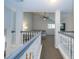 Open loft area with neutral tones, comfortable seating, and abundant natural light at 2206 Green Oaks Ln, Tampa, FL 33612