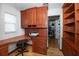 Functional home office with custom cabinets and built-in desk; perfect for work or study at 2206 Green Oaks Ln, Tampa, FL 33612