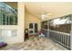 A screened patio offers comfortable outdoor seating, creating an inviting and relaxing space at 2206 Green Oaks Ln, Tampa, FL 33612